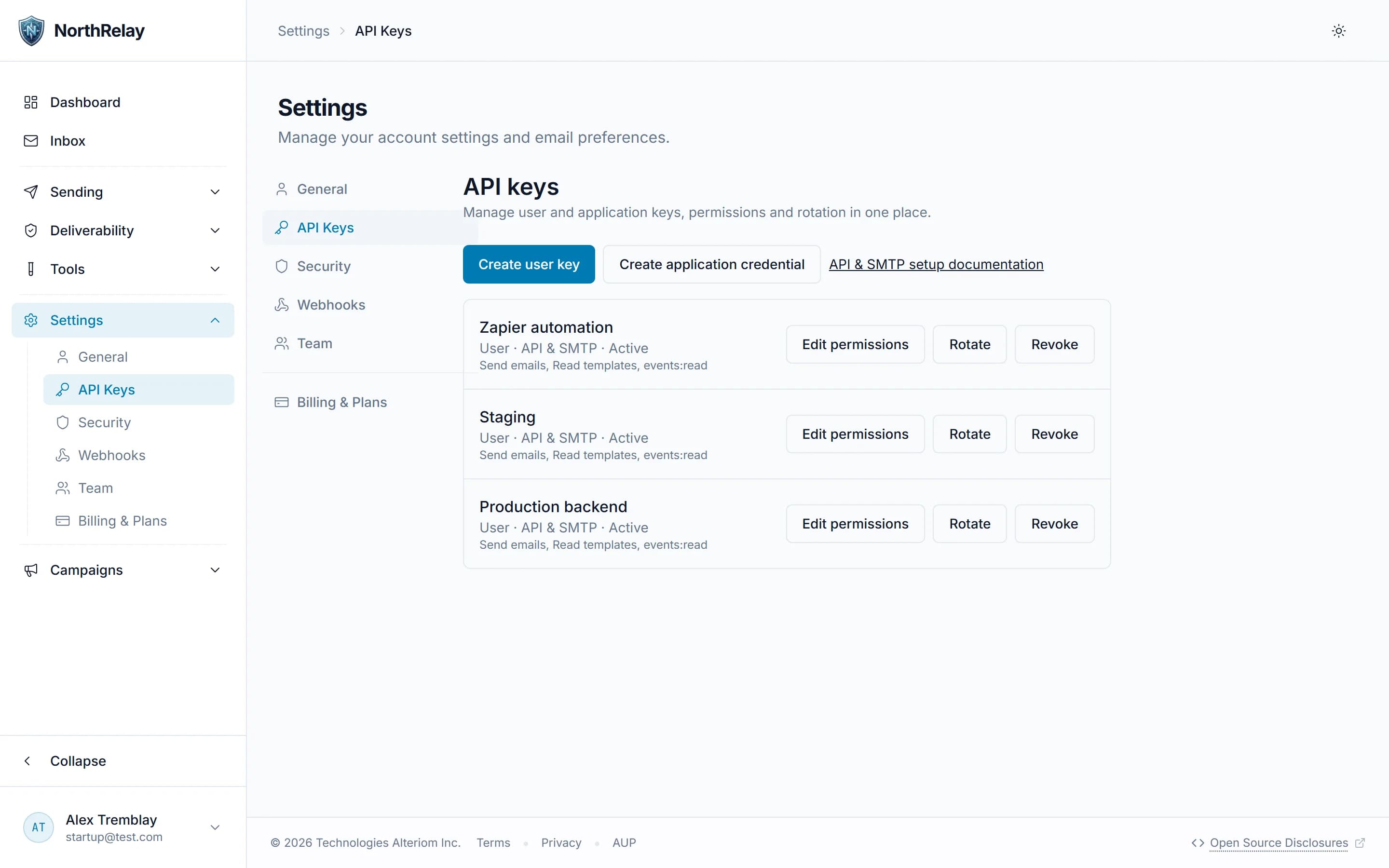 API keys page listing user keys and application credentials with per-key permissions, rotate and revoke actions